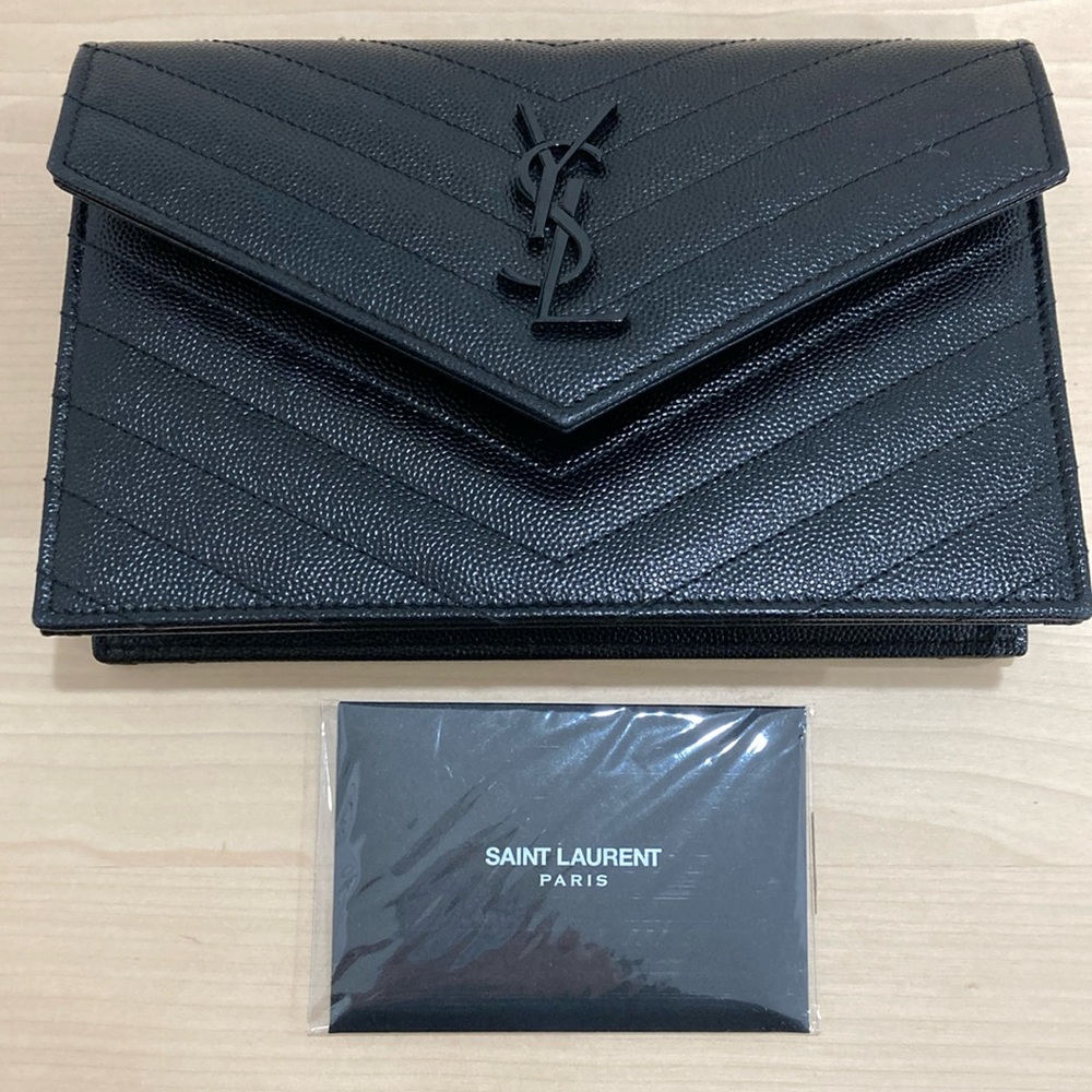 Black on black YSL CASSANDRE ENVELOPE CHAIN WALLET IN GRAIN DE POUDRE LEATHER